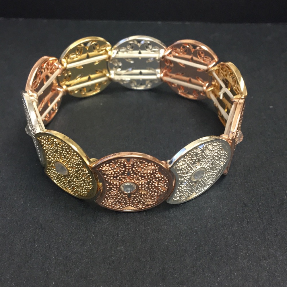 Gold, silver and rose gold stretch bracelet